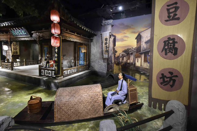 图为广富林文化遗址上海之根复制的先民生活情景.jpg