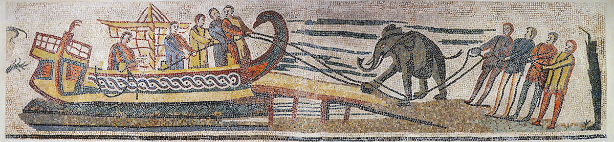 Roman_mosaic_from_Veii_Isola_Farnese_Italy_depicting_an_African_elephant_being_loaded_onto_a_ship_3rd-4th_century_AD_Badisches_Landesmuseum_Karlsruhe_Germany_180256617241200.jpg