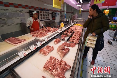 图说：猪肉价格涨幅增加。资料图。中新社记者 武俊杰 摄