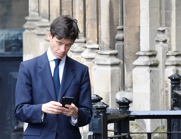 0_Britains-Secretary-of-State-for-International-Development-Rory-Stewart-checks-his-phone-outside-Hou.jpg 0_Britains-Secretary-of-State-for-International-Development-Rory-Stewart-checks-his-phone-outside-Hou.jpg